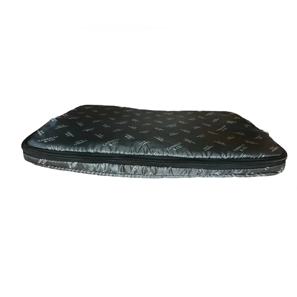 Silver and black Cabrelli & CO. inner laptop case
